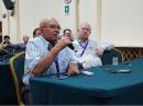 IARU Region 2 Area D Director Marco Gudiel, TG9AGD, asks a question during the ITU presentation.